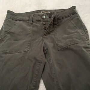 Button waist high rise dark green skinny jeans
